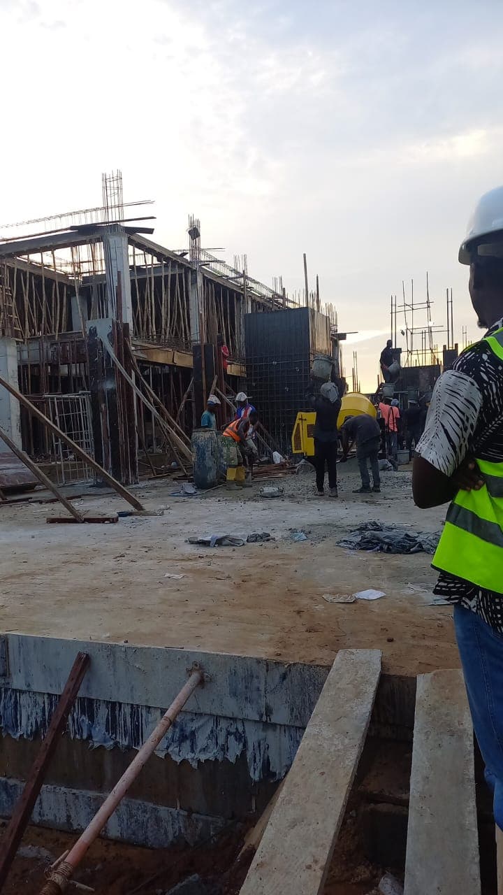 Construction crew working on site at dusk — Sonik Smart City